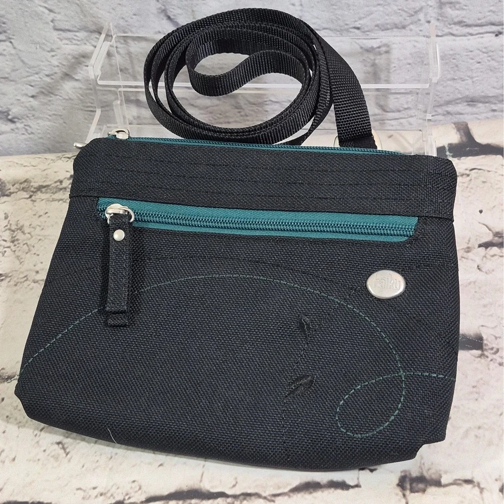 Haiku Impulse Crossbody Bag Black Green Multi-Pocket Travel Purse